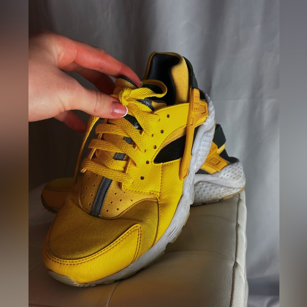 Nike yellow running tennis shoes